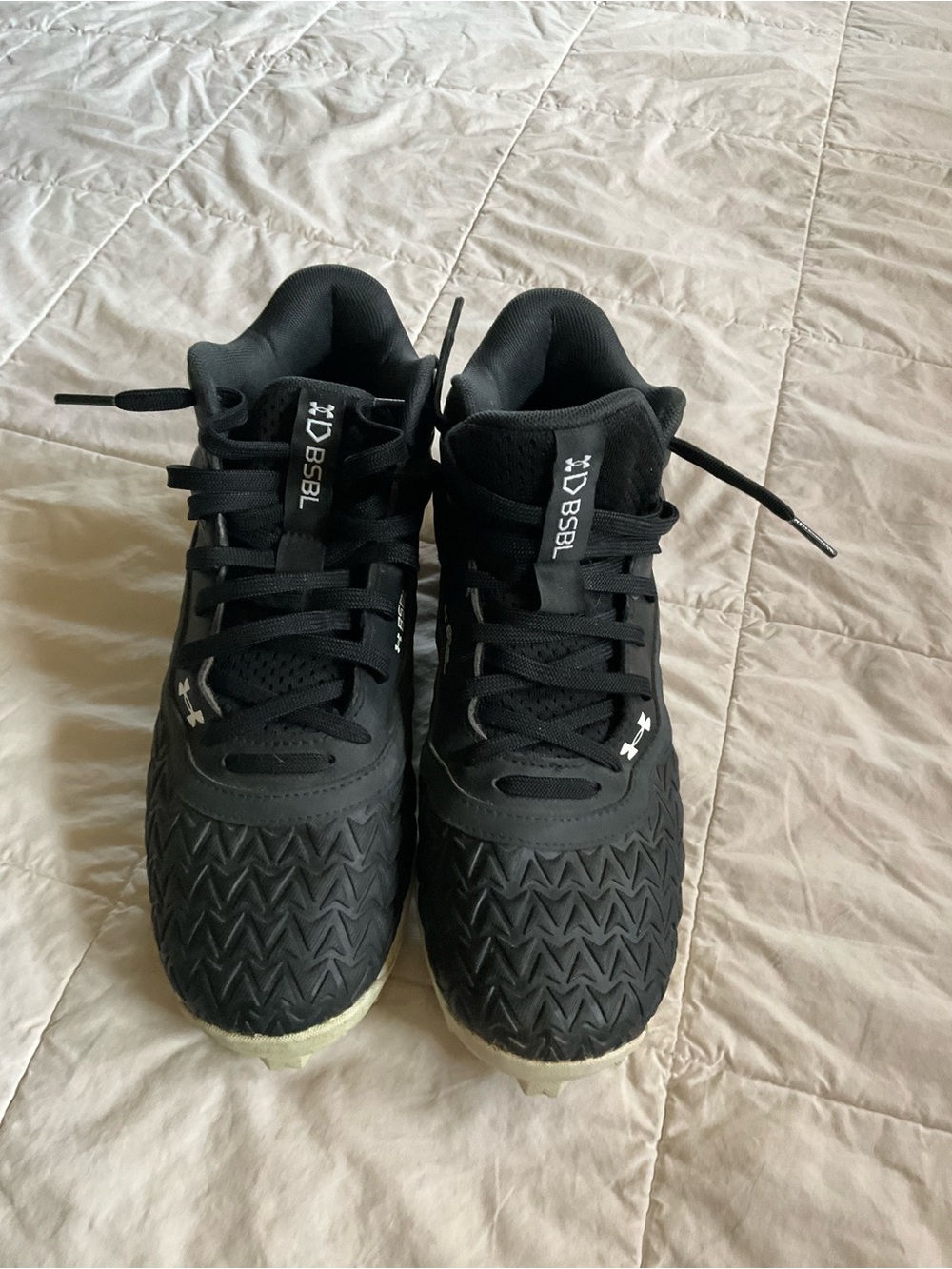 Big boys Under Armour footballs Cleats